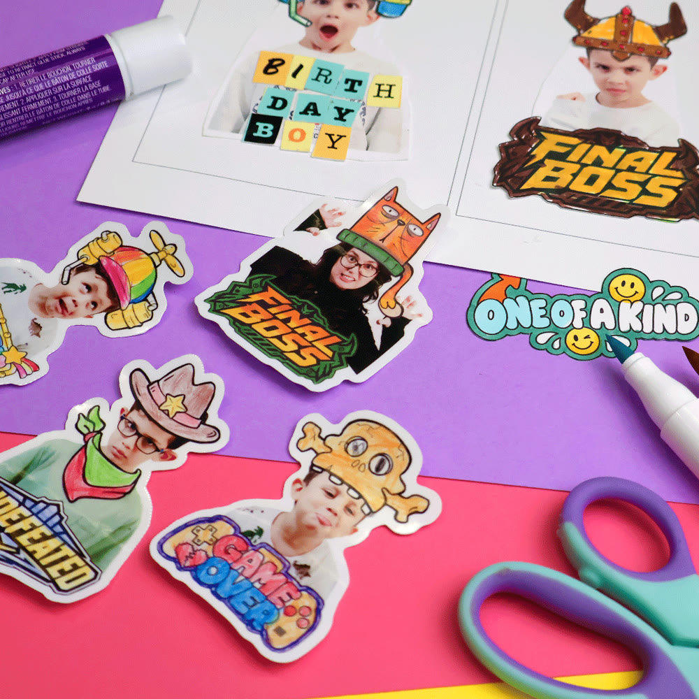 A sheet of decorated photo stickers with scissors and glue